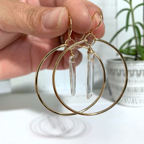 14k gold filled or 925 sterling silver raw crystal quartz boho hoop earrings. Hammered for texture and shine, the hammering process leaves tiny facets on the bars that catch light and sparkle as you wear it. HANDMADE item not manufactured so every piece has it's own uniqueness Made when ordered. Raw or Polished natural quartz points, depending on what I have in my inventory. Attention: Every stone will vary in size and shape for every order because every stone has its own uniqueness. No crystal Quartz Hoop Earrings, Quartz Crystal Jewelry, Boho Hoop Earrings, Handmade Crystal Jewelry, Raw Quartz Crystal, Crystal Hoop Earrings, Feather Jewelry, Diy Crystals, Quartz Jewelry