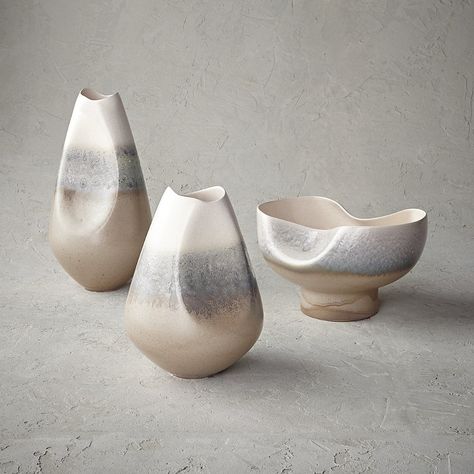 Time-honored pottery techniques produce concaved, organic designs that become more alluring the longer you admire them. Portuguese ceramic is handcrafted using slip casting for a smooth texture. Reactive ivory and gray finishes then produce variegated, one-of-a-kind patterns when fired in the kiln. 100% ceramic. Handcrafted. Handpainted. Bowl is not food safe. Product is not watertight. Clean with a soft, dry cloth. Shape and color may vary slightly due to the handmade nature of this product. Ma Soft Slab Ceramics, Cautious Clay, Ceramics Pottery Bowls, Slab Ceramics, Slip Casting, Pottery Inspo, Organic Ceramics, Unique Pottery, Cerámica Ideas