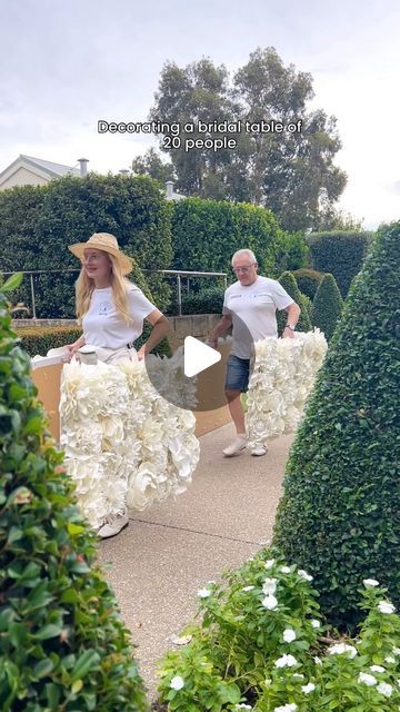 Giant Flowers Australia - Event Styling on Instagram: "This wedding had a bridal party of 20 people! The bride and groom with their many friends wanted to sit all together at the main table…so we have decorated it with our 7 meter giant flower bridal table decor. And the glamorous wedding cake by @cheskabakes_ matched the decor perfectly! 🌹🌹🌹🌹 . . #giantflowersperth #giantflowers #viralvideos #viralreels #florist #flowers #weddingideas #weddinginspiration #perthflowers #perthweddingarch #perthweddings #romanticwedding #diy #crafts #decor #weddingdress #bride #bridaltable #weddingcake" Grand Centerpieces Wedding, Diy Flower Table, Wedding Main Table Decor, Wedding Decor Red Roses, Bridal Table Decor, Glamorous Wedding Cakes, Main Table Wedding, Wedding Australia, Candelabra Wedding Centerpieces