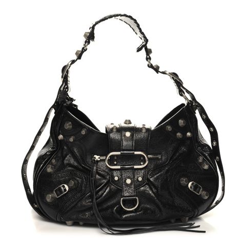 This is an authentic BALENCIAGA Agneau Arena Medium Le Cagole Shoulder Bag in Black. This stylish and structured handbag is crafted of black calfskin leather. The bag features a sturdy leather top handle with silver links, a top zipper, and an adjustable shoulder strap. The top unzips to a black fabric compact interior with a zipper pocket. 2000s Handbags, Black Shoulder Bag Outfit, Thrifting Ideas, Shoulder Bag Outfit, Gothic Bag, Purse Style, Luxury Tote Bags, Dream Bags, Black Balenciaga