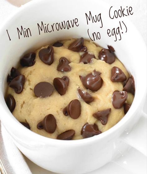 Satisfy your chocolate cravings with this amazing choc chip cookie in a mug! It only takes 1 minute to cook in the microwave. Cookie In A Mug Recipe No Egg, Chocolate Chip Cookies Mug Cake, Chocolate Chip Cookie Mug Cake No Egg, Mug Cookie Microwave No Egg, Mug Cakes Chocolate Chip, Easy Stuff To Bake At Home, Mug Cake Microwave Chocolate Chip, Mug Cookie No Egg, Cookie No Egg