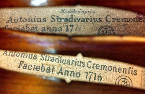 A Stradivarius label can be found in new and old violins, violas and cellos that are not "Strads", but typically, the label isn't intended to fool anyone. Old violins containing an Violin Repair, Stradivarius Violin, Luthier Workshop, Antonio Stradivari, Violin Shop, Violin Makers, Rehearsal Room, Apple Logo Wallpaper Iphone, Historical Objects