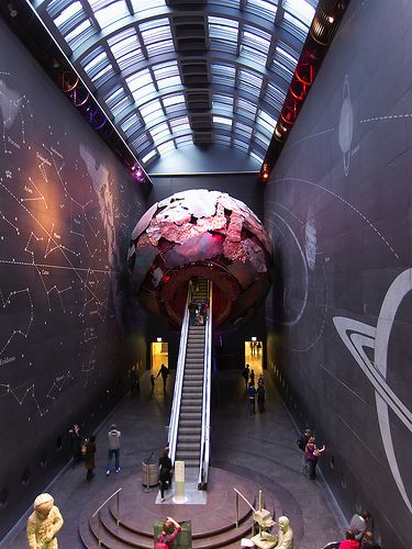 Into the earth's core...The spectular entrance hall to the red zone at the Natural History Museum (London, England), which greets visitors who sensibly avoid the huge queues at the front of the building by using the side entrance next to the Science Museum. #UK Space Museum Architecture, Open Space Architecture, Moon Museum London, Science Museum Exhibition, Space Museum Exhibitions, Science Museum London, Art Haus, Earth's Core, Side Entrance