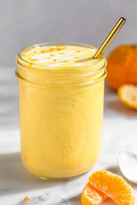 Creamy orange creamsicle smoothie is made with fresh oranges, coconut milk, hidden veggies, protein, and vanilla and tastes just like childhood! Packed with vitamins and minerals for an easy breakfast, healthy snack, and pre or post-workout shake. Smoothie With Protein, Orange Creamsicle Smoothie, Coffee Protein Smoothie, Creamsicle Smoothie, Smoothie Recipes For Kids, Orange Smoothie, Health Drinks, Protein Smoothie Recipes, Austin Food