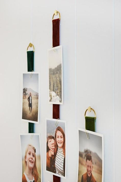 5 Genius DIYs to Display Photos Without Frames | Hunker Diy Wall Photo Display, Photo Display Without Frames, Frameless Photo Display, Creative Way To Display Photos, Mini Polaroid Display Ideas, Picture Line On Wall, Unique Frames For Pictures, Clipboard Photo Display, Frameless Picture Wall Ideas