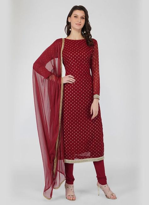 Try our new straight cut suit set, that has beautiful gold foil print on it with gold embroiderd laces on sleeve and hemline and for the bottom it has a very beautiful wine colour churidar paired with a gorgeous maroon dupatta that had gold fringes on 4 sides. Maroon Dupatta, Patiala Dress, Indian Clothing Brands, Indian Dresses Online, Wine Colour, Ethnic Wear Indian, Pakistani Clothes Online, Pakistani Suits Online, Asian Wedding Dress