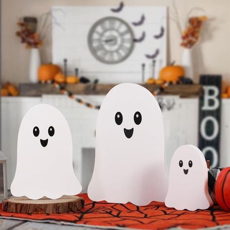 PRICES MAY VARY. Charming Ghost--Enhance your home decor with wooden ghost set. These adorable ghost figures bring a playful and festive touch to any space. Ghost of Three Sizes--Large(8" tall x 5.9" wide) Medium(6" tall x 4.5" wide) Small(4" tall x 3"wide ) Wide x 3/5" High-Quality Material--Each ghost is meticulously crafted from premium wood, ensuring durability and a high-quality finish,which is durable and reusable. Versatile Decoration--Whether arranged on a layered tray, placed on a shelf Halloween Woodworking, Wood Halloween Decorations, Wooden Ghost, Home Shelf, Ghost Decor, Space Ghost, Ghost Signs, Ghost Decoration, Fall Halloween Crafts