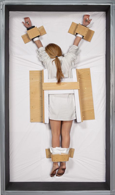 Maurizio Cattelan B. 1960 UNTITLED resin, paint, human hair, garment packing tissues, wood and screws 235.6 by 137.2 by 47 cm. 92 7/8 by 54 by 18 1/2 in. Executed in 2007, this work is number 2 from an edition of 3, plus 2 artist's proofs. Bible Interpretation, Maurizio Cattelan, Resin Paint, White Nightgown, Venice Biennale, Poor Posture, Old Master, Zadig And Voltaire, Magazine Art