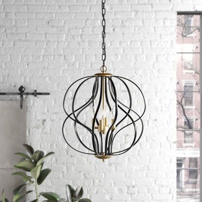 This 4-light chandelier brings a boost of brightness and a vintage-inspired look over your kitchen island or dining room table. It's made from wrought iron with a matte black finish for an industrial vibe we love. An open-work frame features an array of curving geometric designs that encase the gold candelabra inside. The bare 60W candle bulbs (not included) wash your dinner or prep space in a warm glow. They're also compatible with a dimmer switch, allowing you to set the lighting to your likin Black Stairway Chandelier, Black Kitchen Pendants, Modern Farmhouse Lighting Dining Room, Bathroom Chandelier Over Tub, Chandelier Over Tub, Cage Light Fixture, Cool Chandeliers, Glow Shoes, Adjustable Pendant Light