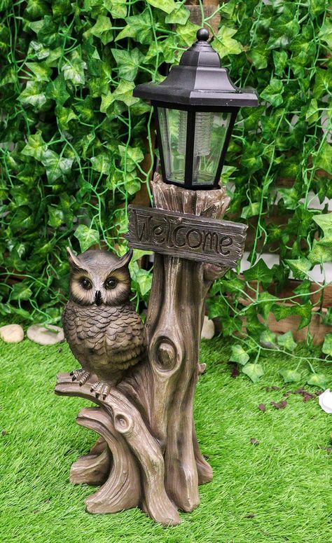 PRICES MAY VARY. This Night Owl Welcome Greeter Solar Statue measures 20.25" tall, 7.5" long and 6" deep approximately. This LED lamp figurine is solar powered and the lantern has an On/Off Switch at the underside of the lantern lip. The lantern will automatically come on in the absence of light. Although the battery sockets show two possible placements of battery, the lantern unit only needs one battery (provided with the lantern). Statue is made of composite resin hand painted and polished ind Solar Powered Lanterns, Garden Owl, Haunted Forest, Tree House Decor, Great Horned Owl, Woodworking Ideas Table, Cool Woodworking Projects, Storing Paint, Beginner Woodworking Projects