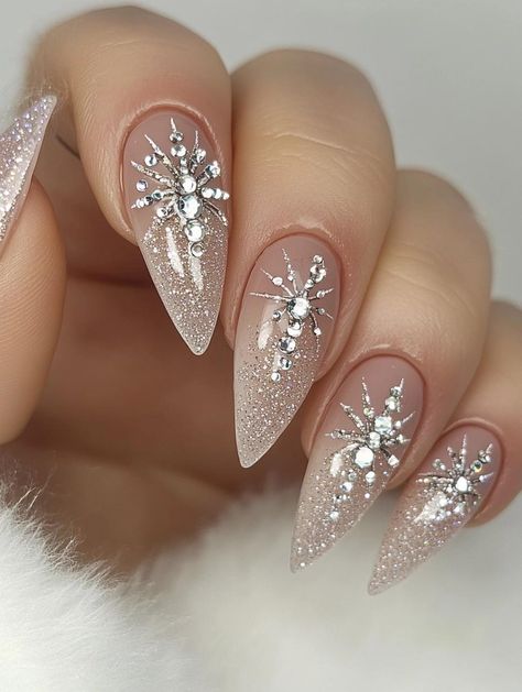 Unleash your inner ice queen with stunning winter acrylic nail designs. Choose from 24 breathtaking options that capture the beauty of the season. From glacial blues to sparkling silvers, these manicure ideas will add a touch of frosty elegance to your cold-weather ensemble. Stand out with these eye-catching nail creations. Christmas And Winter Nails, Winter Christmas Nails 2024, Winter Bling Nails, Frosty Nail Designs, Christmas Winter Nails Gel, Clear Winter Nails, Classy Christmas Nail Designs, Christmas Elegant Nails, Winter Wonderland Nail Designs