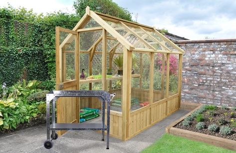 High quality planting table made from galvanized steel. The potting bench is particularly sturdy & protected. extremely mobile due to its wheels & a sturdy hand... Wood Greenhouse Plans, Wood Greenhouse, Rustic Greenhouses, Timber Greenhouse, Wooden Greenhouse, Cheap Greenhouse, Modern Greenhouses, Victorian Greenhouse, Best Greenhouse