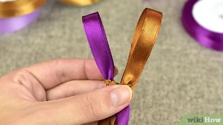 How to Make Ribbon Leis: 14 Steps (with Pictures) - wikiHow Ribbon Leis Diy Tutorials Easy, Easy Ribbon Leis For Graduation, Ribbon Lays For Graduation, Graduation Ribbon Leis How To Make, Graduation Leis Diy Ribbons How To Make, How To Make Graduation Leis Tutorials, Easy Leis For Graduation, Grad Leis Diy, Ribbon Leis Diy Tutorials