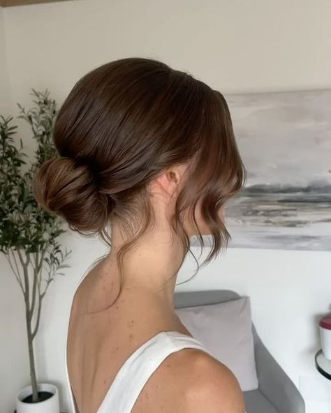 Rachel | Calgary Bridal Hair on Instagram: "Organic Updo Appreciation🙌🏻 I absolutely loved the challenge of doing an all natural updo for my beautiful bride Ts day! After listening to @christinakreitel healing a hairdresser series- this felt like it was 100% meant to be Brands used to achieve this textured look: @carinaorganics @innersenseorganicbeauty @livinglibationsofficial Products used in order: Volumizing Foam Prep Spray Powder dry shampoo & Non-aerosol hairspray Thank you for trusting my techniques to style your hair T♥️ #organichair #organichairproducts #haireducation #yychair #yychairstylist #yycweddings #yycweddingvendors #canadianhairstylist #albertahairstylist #weddinghairstyles" Undone Low Bun Wedding, Bridal Soft Updo, Low Do Wedding Hair, Bridal Bun Brown Hair, Hair Updos Brunette, Messy Low Bun Bridal Hair, Wedding Hair Minimalist, Brunette Low Bun Wedding, Bridal Updo Medium Length Hair