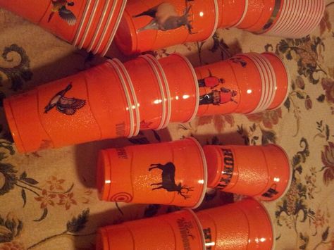 Hunter orange solo cups I decorated with scrapbook stickers for a Duck Dynasty/ hunting theme birthday party. Duck Dynasty Party, Deer Hunting Birthday, Hunting Birthday Party, Camo Birthday Party, Bos Baby, Deer Party, Dinner Planning, Camo Birthday, Hunting Theme