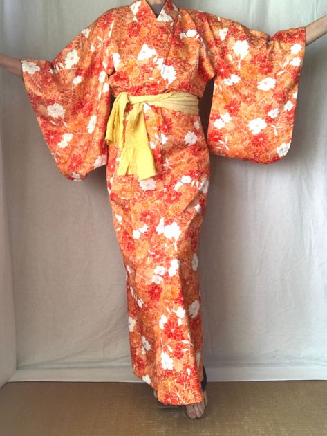 "Japanese Kimono Robe Silky Floral Women's Long Orange Dressing Gown Size M International Express Shipping includedsee below) MATERIAL: Textured silky synthetic kimono with shibori silk sash. COLOR: Orange & white with yellow sash. PATTERN: Floral. Condition: Used. 2 tiny dots on interior lining, otherwise like new. Sash included. Kimono are Dry Clean Only. SIZE: Woman's size MEDIUM Kimono. Wingspan- 50 inch (127 cm) across the top, sleeve end to sleeve end. Length- 60 inch (152.5 cm) from n Orange Kimono Traditional, Sash Pattern, Orange Kimono, Orange Dressing, Kimono Traditional, Kimono Dressing Gown, Traditional Japanese Kimono, Shibori Silk, Wedding Kimono