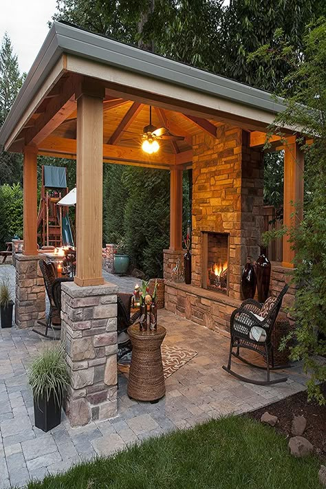 Adding an Outdoor Living Space can turn a view from a window into a main destination for family and friends in the Landscape, under your covered structure, near your outdoor kitchen. Even if an outdoor fireplace is standing alone on your paver patio, or a simple water feature, you will definitely be pulled out from indoor to the outdoor to enjoy the space. Traditional Patio, Indoor Outdoor Fireplaces, Outdoor Covered Patio, Outdoor Fireplace Designs, Outdoor Fireplace Patio, Outdoor Patio Designs, Patio Fireplace, Outdoor Pavilion, Backyard Fireplace