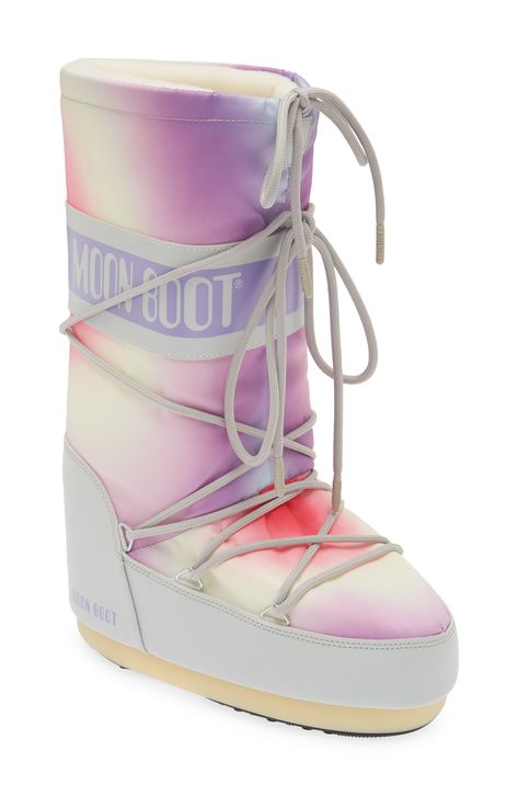 Enchant your cold-weather 'fits with the iconic Moon Boot revitalized in a candy-colored rendition complete with plush insulation. The signature ambidextrous design and crisscrossing tubular laces ensure that you always have the perfect fit. 14" shaft, 19" circumference (size 44) Lace-up style Drawcord-toggle cuff Water-resistant Textile and synthetic upper/synthetic lining/rubber sole Imported Ankle Snow Boots, 2022 Style, Moon Boot, Pastel Tie Dye, Sneaker Sale, Grey Tie Dye, Grey Boots, Moon Boots, Pretty Bags