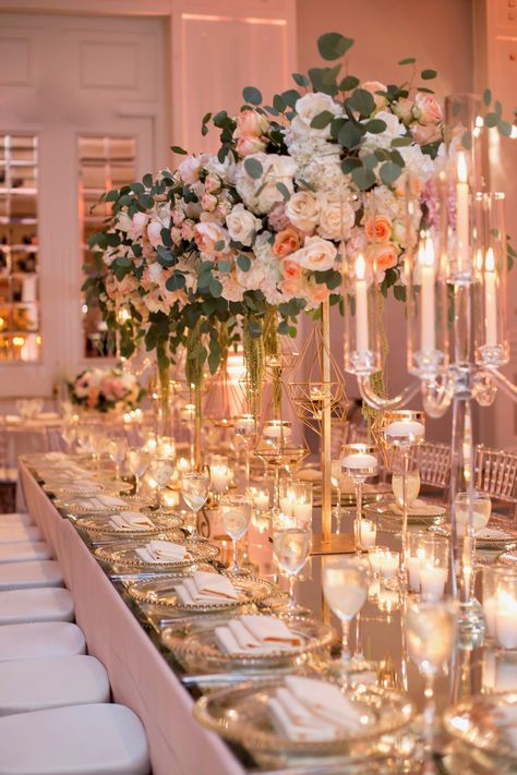 Timeless and elegant wedding. Picturesque floral arrangements. Touches of peach and blush, white color scheme. Romantic and intimate. Dazzling ballroom. Live band. Planned by Best Bride.  www.bestbride.la www.instagram.com/bestbride_ #wedding #peach #pink #jewish #elegant #classic #garden #white #floral #table #centerpiece Soft Pink Wedding Reception, Pink White Gold Floral Arrangements, Classic Blush Wedding, Peach And Ivory Wedding Decor, Wedding Decorations Classic Elegant, Ballroom Floral Arrangements, Peach Wedding Reception Decor, Pink White And Gold Wedding Receptions, Blush Pink And Gold Wedding Theme