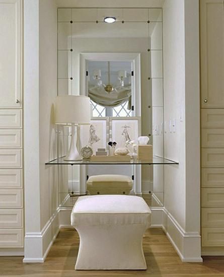 22 Small Dressing Area Ideas Bringing New Sensations into Interior Design Small Dressing Rooms, Floating Glass Shelves, Closet Vanity, Makeup Area, Mirrored Wall, Upholstered Stool, Dressing Area, Interiors Design, Master Closet