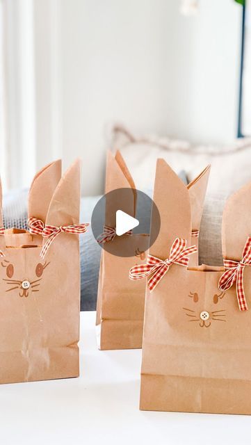 ANNIE DIAMOND💎Most Lovely Things Blog on Instagram: "These sweet diy bunny bags are so easy to make using Kraft or white paper lunch bags, a marker, some shred (or Easter grass), ribbon and a button.  Drop in a few treats. Easter candy, fun socks, gift card…whatever you want…that will fit in a lunch sack…that you’ve made quite a bit smaller due to the ears! Save this post or send to a friend that loves simple crafts with stuff you probably already have on hand!   How to make the bunny bags  1. Take a paper bag and fold it in half lengthwise, with the bottom of bag  2. flap facing in 3. Now with the open fold to the right, draw the ears and cut from the folded side. 4. Open bag and you have your bunny ears. 5. Draw a face just above the bottom bag flap 6. Open and fill with shred or Easter Treat Packaging, Lunch Sack, Diy Bunny, Draw A Face, Paper Bag Design, Paper Lunch Bags, Sack Lunch, Send To A Friend, Bunny Treats