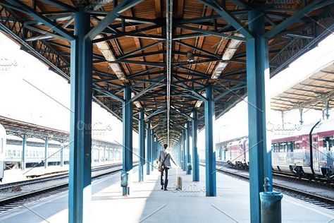 Mature businessman on a train station. Train Platform, On The Train, Sydney Harbour Bridge, The Train, A Train, Train Station, Brooklyn Bridge, Rear View, Business Man