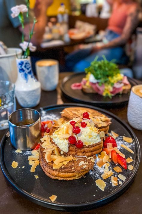 Looking for a delicious breakfast in Amsterdam? Here are the absolute best breakfast places in Amsterdam you have to try! | Amsterdam travel tips | Amsterdam travel guide | Where to eat in Amsterdam | Best breakfast spots in Amsterdam | Best cafes in Amsterdam | Amsterdam food guide | Where to eat breakfast in Amsterdam | Amsterdam cafe aesthetic | Amsterdam breakfast aesthetic | Best breakfast in Amsterdam | Amsterdam breakfast mornings | Brunch Amsterdam breakfast | Best brunch in Amsterdam Best Coffee Shops In Amsterdam, Amsterdam Street Food, Amsterdam Food Guide, Amsterdam Breakfast, Breakfast In Amsterdam, Amsterdam Travel Tips, Aesthetic Amsterdam, Places In Amsterdam, Amsterdam Cafe