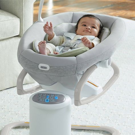 The Graco® Soothe My Way™ Baby Swing with Removable Rocker features 8 soothing motions in 2 directions, for 16 ways to soothe baby. The 2-in-1 design offers a swing seat that doubles as a removable rocker for use throughout the home. Plush fabrics and a removable body support provide added comfort for your little one. The multi-directional seat allows baby to swing facing front, right, or left, for the most soothing options. A 5-point harness keeps baby secure. 6 swinging speeds allow parent to Crib Hammock Baby, Amazon Baby Room, Baby Bouncer Seat, Graco Baby, Baby Gadgets, Baby Swing, Baby Bouncer, Baby Necessities, Body Support