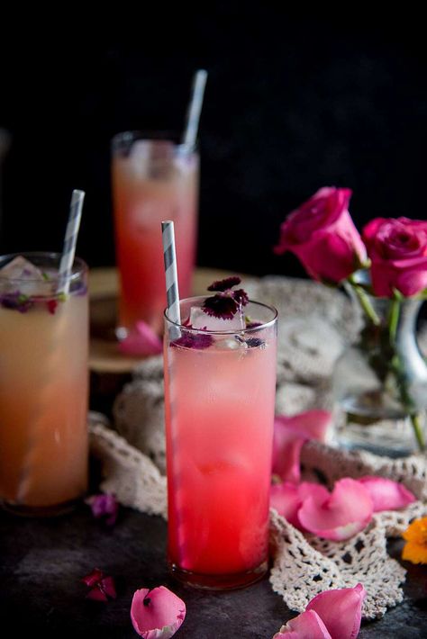 Floral Ginger Rose Fizz - A gorgeous spicy and floral mocktail made with Rose syrup, lemon juice, ginger and club soda! Perfect for Spring and Summer celebrations and especially Valentine's Day.. #RoseDrinks #FloralDrinks #ValentinesDay #CelebratoryDrinks #SpringRecipes Rose Drink, Ginger Rose, Limoncello Cocktails, Cocktail Rose, Rose Syrup, Ginger Cocktails, Fun Summer Drinks, Gin Recipes, Pretty Cocktails