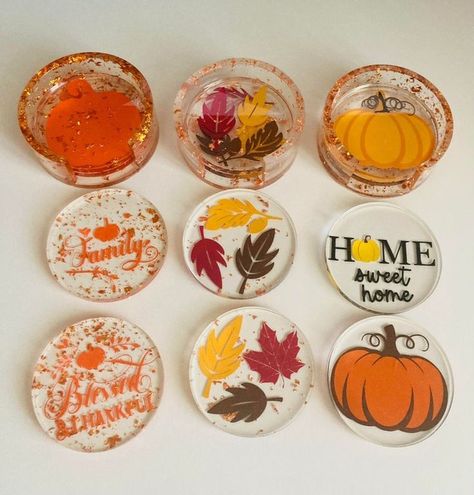 Fall Resin Coaster Set of 4 with Matching Coaster Holder _ Unique Fall Coasters _ Autumn Coasters _Thanksgiving Coasters Fall-themed coasters with pumpkins, leaves, and Family, Home sweet home, and Blessed & Thankful messages. | Sky Rye Design Christmas Resin Coasters, Thanksgiving Coasters, Fall Coasters, Diy Resin Coasters, Resin Coaster, Coaster Holder, Unique Fall, Round Coasters, Epoxy Resin Crafts