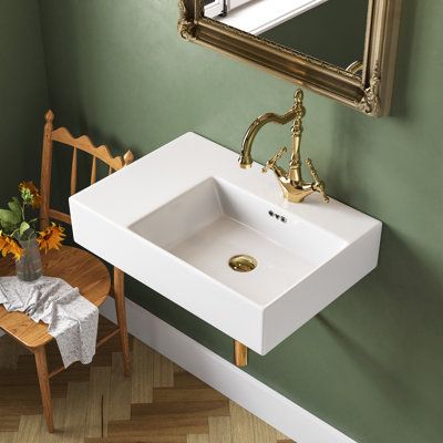 Elevate your bathroom with our exquisite Wall-Hung Sink, a bold statement that complements any setting. Made of high-quality ceramic, this wall-mounted sink bears the excellent quality and durability you can expect from DeerValley. The raised surface adds functionality, allowing you to personalize your space with decor or essentials within easy reach. | DeerValley 23.4" x 16.5" Rectangular Vitreous China Wall Mount Bathroom Sink w / Overflow 5.71 H x 23.43 W x 16.54 D in White | 23.43" L X 16.54 Small Bathroom Sink Shelf, Wall Hanging Bathroom Vanity, Small Wall Hung Vanity, Wall Mounted Sink Bathroom Small Spaces, Exposed Bathroom Plumbing, Freestanding Bathroom Sink, Mounted Sink Bathroom, Floating Sink Bathroom, Wall Mounted Sink Bathroom