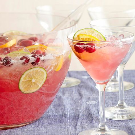 For your next girls night, enjoy delicious cosmos: http://www.bhg.com/recipes/drinks/wine-cocktails/party-drink-recipes/?socsrc=bhgpin060114cosmofruitpunch&page=6 4th Of July Wine Spritzer, Punch Recipes Alcoholic, Alcohol Punch Recipes, Drink Dispenser Recipes, Party Punch Alcohol, Pretty Punch, Party Beverages, Non Alcoholic Punch, Fun Drink Recipe