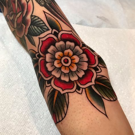 Traditional Flower Tattoo | Color Mandala | American Traditional Tattoo | Colton James Phillips | Gap Filler | Classy Tattoos | Tattoo Patterns | Geometric Flower | Traditional Geometric Tattoo #traditionalflowertattoo Tattoos For Women With Kids, Traditional Tattoo Sleeve Filler, Traditional Mandala Tattoo, Traditional Hand Tattoo, Floral Mandala Tattoo, Mandala Flower Tattoos, Traditional Tattoo Inspiration, Traditional Tattoo Flowers, Color Mandala