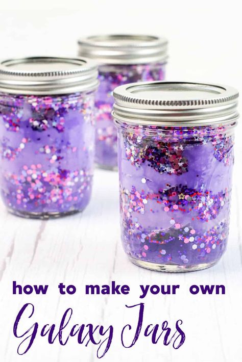 This fun and easy craft is perfect for space fanatics of all ages. With just a few simple supplies, you can create your own DIY galaxy in a jar. These gorgeous sensory jars are the perfect way to relax, calm down, and unwind. Stellar Craft Ideas, Galaxy Jar Craft, Galaxy Crafts For Toddlers, Out Of This World Crafts, Galaxy Jars Diy For Kids Easy, Calming Jars For Kids Diy, Sensory Jars Diy, Galaxy Activities For Kids, Galaxy Jars Diy For Kids