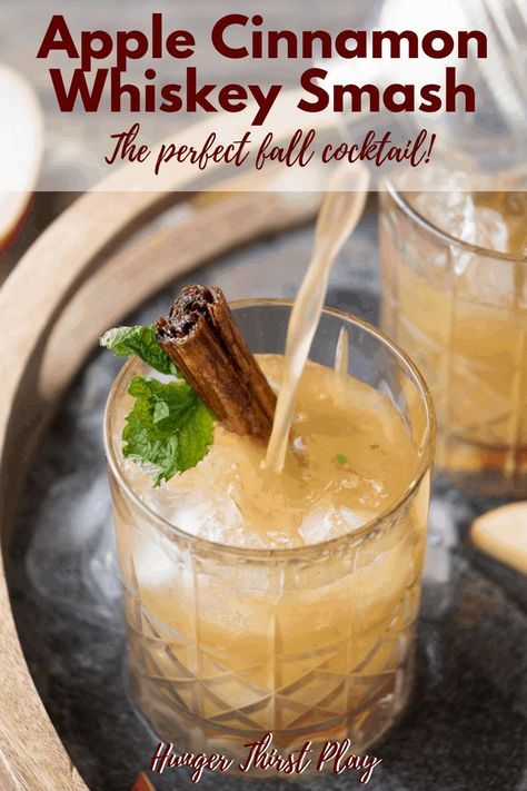 Aug 17, 2019 - Crisp apple and fresh mint laced with warm, spicy cinnamon and beautiful tones of rich rye whiskey blend together in Apple Cinnamon Whiskey Smash Cocktail. Apple Cinnamon Whiskey, Whisky Smash, Whiskey Smash, Cinnamon Simple Syrup, Cinnamon Whiskey, Coctails Recipes, Fall Cocktail, Thanksgiving Cocktails, Crisp Apple