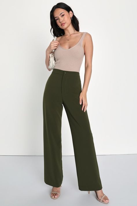 Have all the confidence you need with the Lulus A Power Mood Olive Green High-Waisted Wide Leg Trouser Pants! Lightweight crepe woven fabric shapes a boss-babe, high banded waist with a hidden zip fly and a covered button closure. Wide pant legs fall to ankle-grazing hems and feature decorative welt pockets at the back. Fit: This garment fits true to size. Length: Floor length. Size medium Inseam: 30.75 Front Rise: 12.00 Waist: Fitted - very fitted at natural waist. Hip: Fitted - consider sizing Green Trousers Outfit, Olive Green Pants Outfit, Olive Green Outfit, Wide Leg Trousers Outfit, Best Work Pants, Green Pants Outfit, Dark Green Pants, Olive Clothing, Green Dress Pants