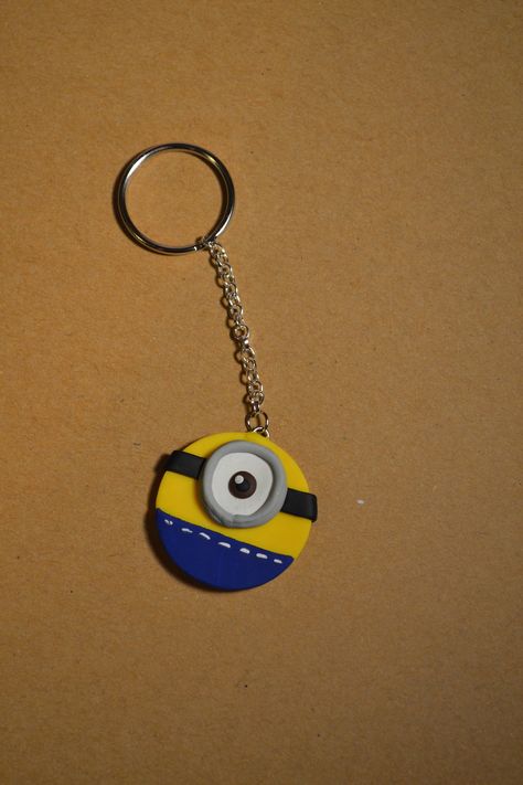 Minion Clay Art, Fevicryl Mouldit Clay Art Keychain, Air Dry Clay Ideas Keychain, Mouldit Keychain Ideas, Cardboard Keychain, Gantungan Kunci Clay, Mouldit Clay Keychain, Mouldit Clay Art Keychain, Clay Art Keychain