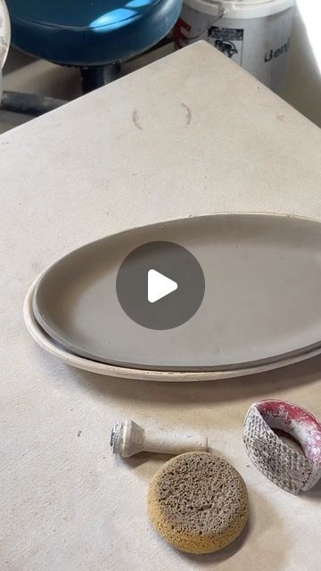 Joyful Clay, Sarah Sewell-Tippin on Instagram: "Making a platter part 2.  . . . #handmade #handbuiltpottery #handbuilding #ceramics #pottery #joyfulclay #marylandmade #annapolismd #wednesdayvibes #kitchenessentials #etsyfinds #giftideas #potterylove #claylove #potterslife #productionpottery #lovemyjob #maker #makersgonnamake #makearteveryday #makeart #artist #potteryvideo #pottersofinstagram" Ceramic Cake Plate Stand, Handbuilt Ceramic Plates, How To Make Ceramic Plates, Slab Plates Ceramics, Pottery Slab Ideas, Clay Kitchen Decor, Pottery Templates Free Printable, Pottery Handbuilding Ideas, Handbuilding Pottery Ideas