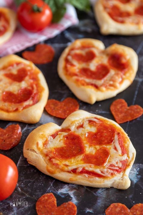 Heart shaped pizza for the win! This delicious heart shaped pizza recipe is the BEST choice for your Valentine's Day dinner. Learn how to make the cutest homemade mini heart shaped pizza with heart shaped pepperoni and a pizza crust hack that you'll use for years to come. Best of all, you can make enough for the whole family in just minutes. Keep this DIY recipe up your sleeve for fun Valentine's Day party food for the kids, or as a sweet way to say "I love you" for Valentine's Day lun Heart Shaped Pizza Recipe, Valentines Day Pizza, Shaped Pizza, Meals Kids Love, Heart Shaped Pizza, Family Friendly Dinners, Valentines Day Dinner, Valentine's Day Party, Diy Recipe