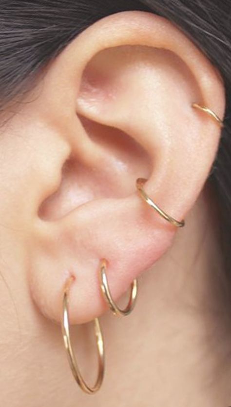 simple multiple ear piercing ideas for teens for women gold ring hoop earring conch cartilage helix for minimalists Piercing Simple, Piercing Snug, Women Gold Ring, Conch Ring, Ear Peircings, Ear Piercings Chart, Ear Piercing Ideas, Double Ear Piercings, Piercing Conch