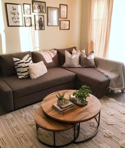 a farmhouse living room with a brown sectional, a duo of coffee tables, a black and white gallery wall is cool درج السلم, Brown Sofa Living Room, Living Room Decor Brown Couch, Couches Living, Brown Couch Living Room, Brown Living Room Decor, Real Homes, Small Living Room Decor, Brown Living Room