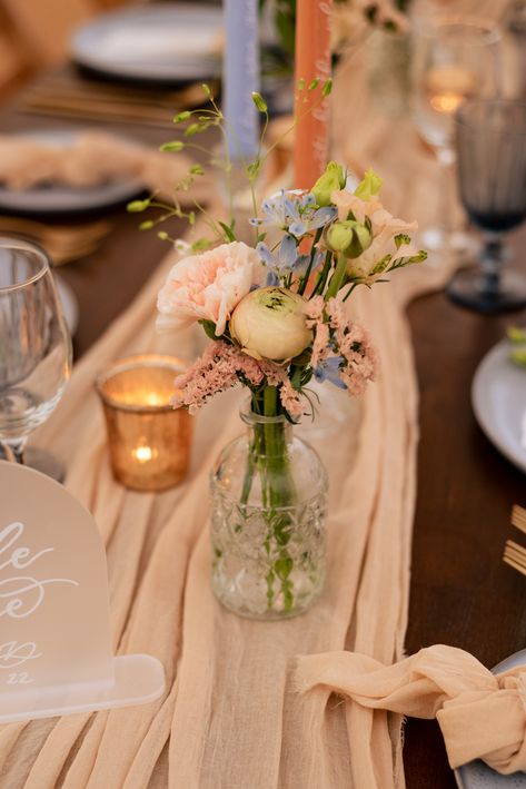 Pastel peach, blue and blush wedding floristy. Wedding bud vases amongst a romantic style tablescape. Floristry by @LilyandLiz. Baby Blue And Peach Wedding, Pastel Tablescape, Light Blue And Peach Wedding, Vintage Bud Vases, Blue And Peach Wedding, Peach And Pale Blue Wedding, Periwinkle And Peach Wedding, Vintage Pastel Wedding, Blue Peach Wedding