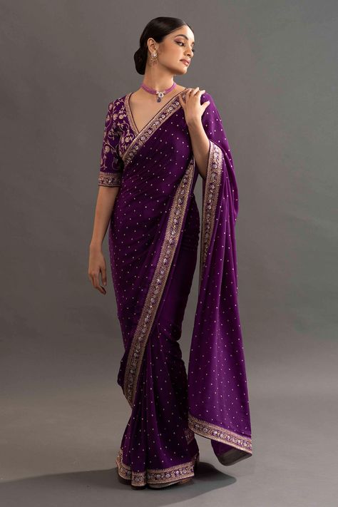 Violet crepe saree with all over buttis and zari embroidered border. Comes with embroidered blouse. Component: 2 Pattern: Embroidered Type Of Work: Floral Neckline: V neck Sleeve Type: Elbow length Fabric: Crepe Color: Purple Other Details: Zari embroidered border Occasion: Reception,Wedding - Aza Fashions Kavitha Gutta, डिजाइनर कपड़े, Wedding Sarees Online, Purple Saree, Fancy Sarees Party Wear, Crepe Saree, Saree Blouse Patterns, Indian Fashion Saree, Saree Designs Party Wear