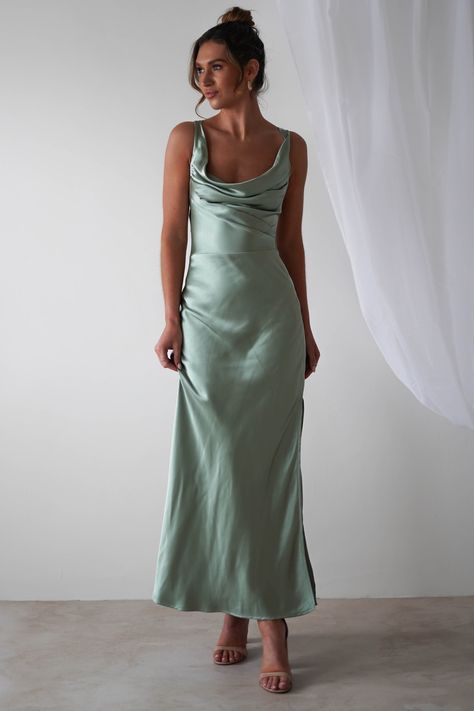 Highlights Gorgeous satin maxi dress with cowl neckline Beautiful open-back detail Ruched waist Also available in Blue Sizing The model is 5'10 and wears UK size 8 / S / US size 4 Fit & Fabric Made from 100% Polyester Hidden side zipper True to size Length from top of shoulder to hem: 138cm Stretch:  5/10 Perfect f Sage Dresses Bridesmaid, Prom Dress Sage Green, Light Green Formal Dress, Light Green Bridesmaid Dresses, Oh Hello Clothing, Sage Green Bridesmaid, Dress Sage Green, Green Satin Dress, Bridesmaid Dresses Satin