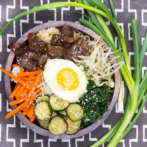 Bibimbap • Korean rice bowl with marinated beef, assorted vegetables, fried egg, spicy sauce • Panning The Globe Korean Rice Bowl, Korean Bibimbap, Bibimbap Recipe, Bo Bun, Bulgogi Recipe, Salmon Rice Bowl, Korean Rice, Bulgogi Beef, Salmon And Rice