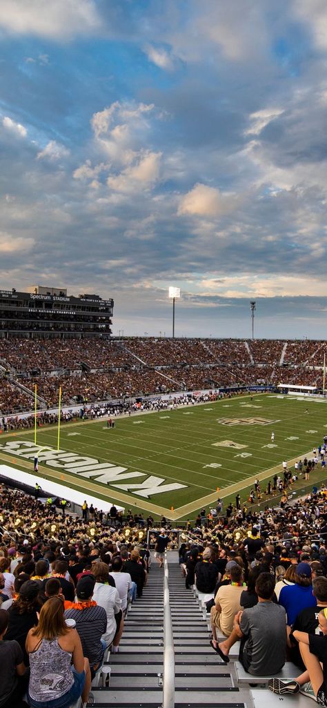 Charge on and show your UCF school spirit by saving this football stadium mobile wallpaper!📱⚡️💛 #UCFSocial #UCFWallpaperAesthetic House Phone Wallpaper, Ucf Football, House Phone, College Tailgating, College Vision Board, Florida Football, Best Colleges, Colleges In Florida, College Motivation