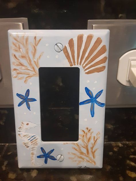 Hand painted rocker electrical switchplate cover. Beach design adds charm to any room.  I use oversized covers that are sprayed with a UV resistant coating to protect from fading.  Matching screws are included . Custom orders are welcome.