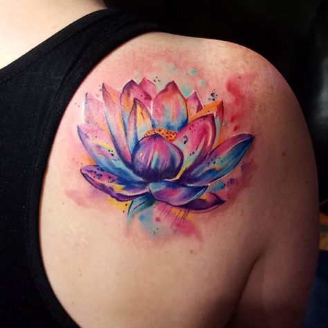 Vibrant Lotus Flower Tattoo Ideas for Women #tattoos #tattooideas #lotustattoo #lotusflower #tattoosforwomen Lotus Tattoo Shoulder, Flower Tattoo Ideas For Women, Watercolor Lotus Tattoo, Lotus Flower Tattoo Ideas, Women's Tattoos, Tattoo Bunt, Wildflowers Tattoo, Lotusblume Tattoo, Small Lotus Flower Tattoo