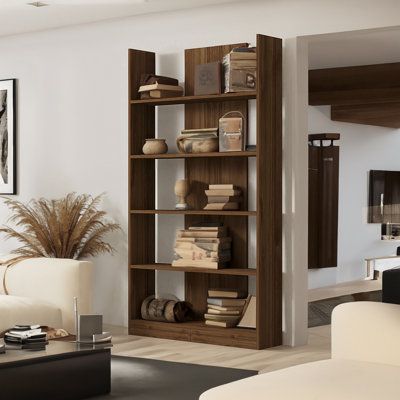 It gives your house a sophisticated touch with its warm walnut hue and streamlined form that fits into any interior theme. With its several shelves, this bookshelf offers plenty of room for storing your books, picture frames, and ornaments. You can maintain a clean and organized living space by keeping your items neatly stored in the extra storage compartments. Inspired by Scandinavian design's simplicity and minimalism, this bookcase blends style with utility. It's the ideal complement to any s Modern Bookshelf Living Room, Tall Shelf Decor Living Room, Bookshelf Living Room Ideas, Modern Bookshelf Wall, Walnut Living Room Furniture, Walnut Bookshelf, Modern Bookshelf Design, Room With Bookshelves, Bookcase Inspiration