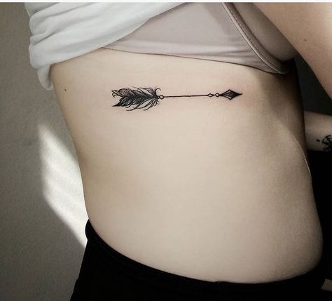 Tattoos That Symbolize Independence, Arrow Tattoos For Women On Ribs, Arrow Tattoo Placement For Women, Arrow Tattoo Placement, Fine Line Arrow Tattoos For Women, Curved Arrow Tattoo, Arrow Tattoo Placements, Tattoo Placement For Women, Tattoo Line Work